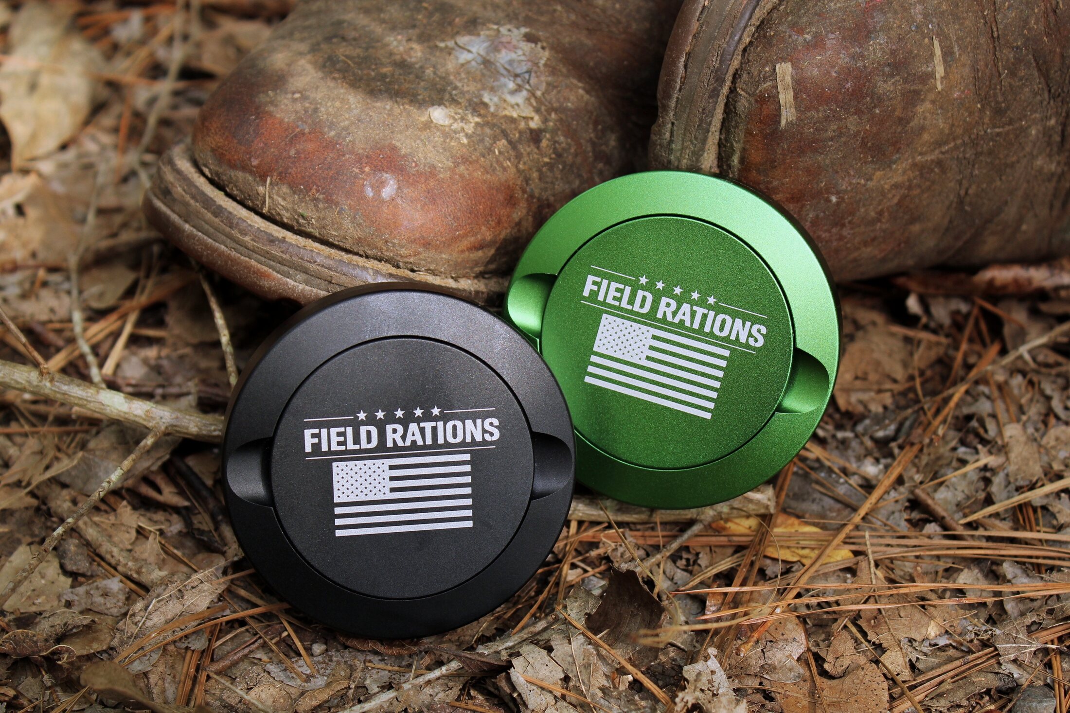 Field Rations Co. cans against worn work boots
