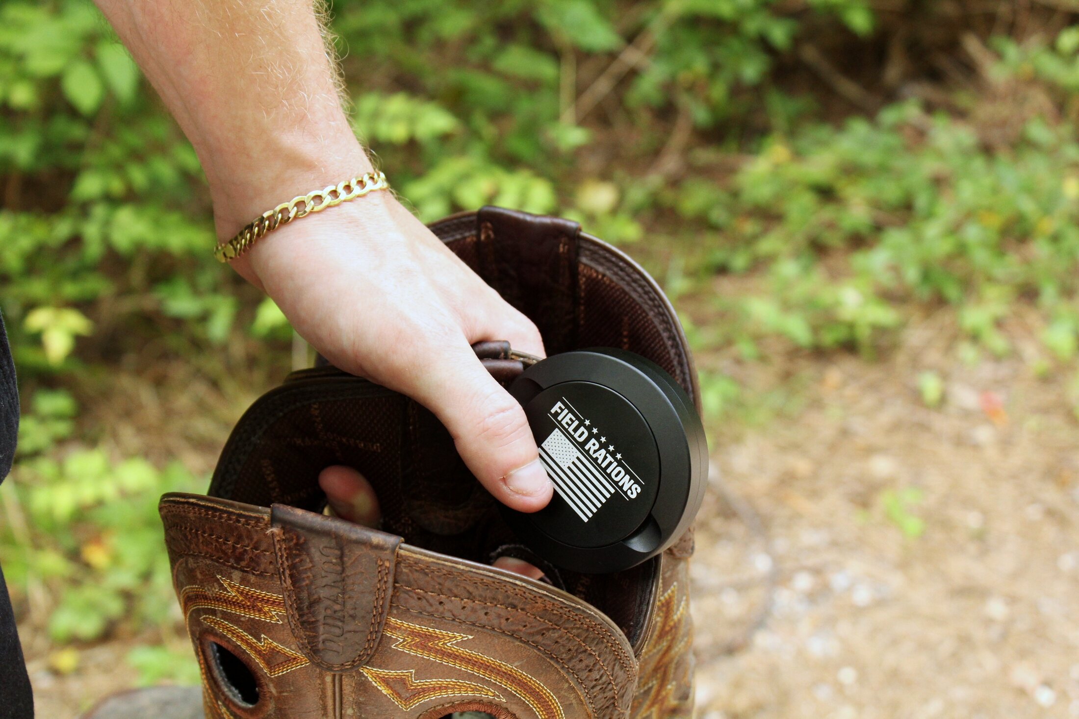 Pulling a Field Rations can from a boot shaft