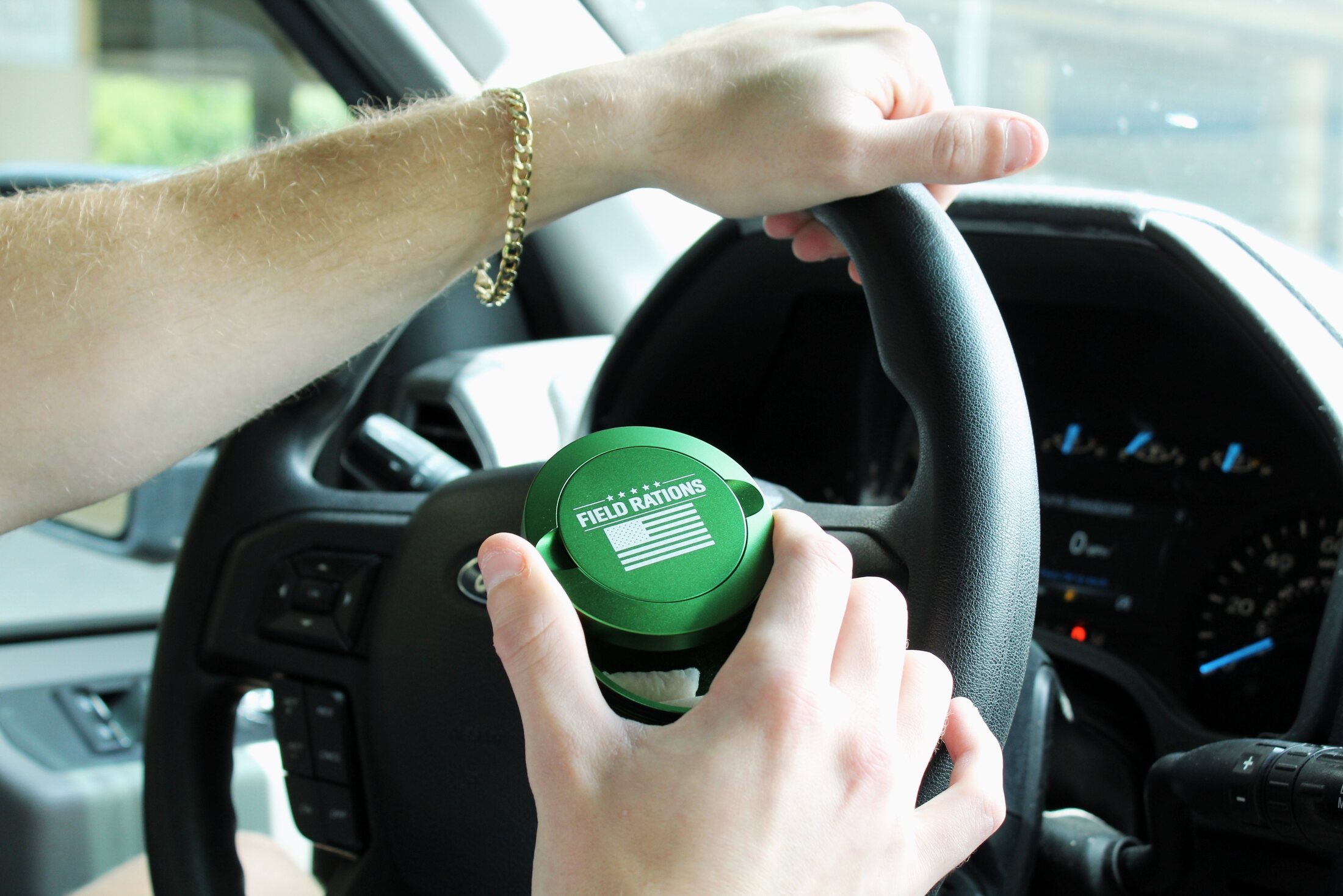 Field Rations can on a truck steering wheel